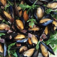 A photo of Double Smoked Bacon Tarragon Mussels