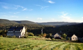 Photo of rolling hills and Chanterelle cottages
