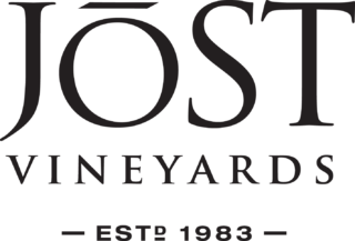 Photo of Jost Vineyards logo updated in 2020 - it says Jost Vineyards est. 1983