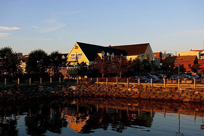 Rudder's Seafood Restaurant from the Yarmouth harbour at sunset