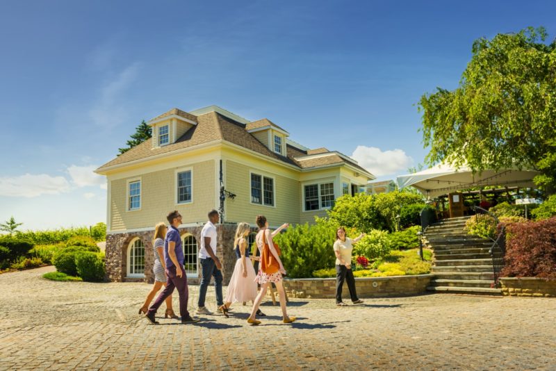 Photo of a group of people on a tour outside of Grand Pre Wines