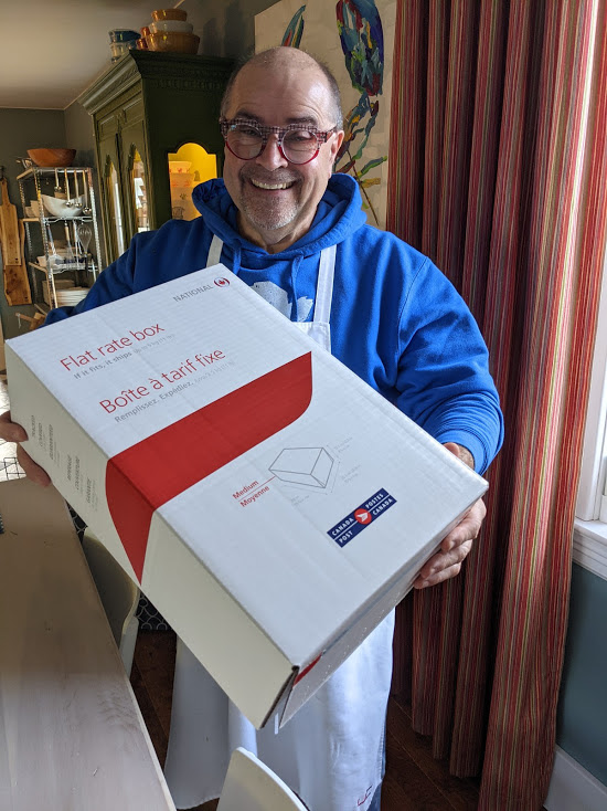 Image of Chef Alain Bosse holding The Kilted Chef Foodie Box