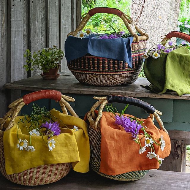 Four picnic baskets arranged. 