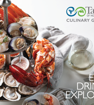 Photo of the cover of the 2022 Culinary Guide, featuring a seafood tower with lobster, shrimp, smoked salmon, oysters and more.