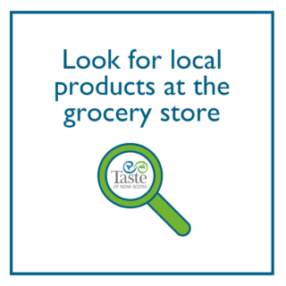 A text-based photo on a white background. Text reads in blue font "Look for local products at the grocery store" and shows an illustration of a magnifying glass. The entire Taste of Nova Scotia logo is visible through the lens of the glass.