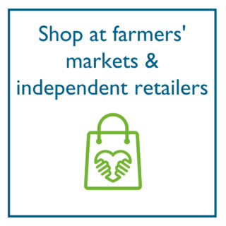 A text-based photo on a white background. Text reads in blue font "Shop at farmers' markets & indepdendent retailers" and shows an illustration of a bag below the text. The bag has an icon showing an illustration of a heart and two hands holding it.