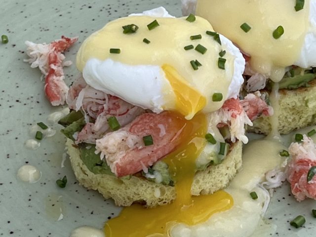 A close-up photo of snow crab and avocado toast, featuring snow crab from Victoria Co-Operative Fisheries Ltd.