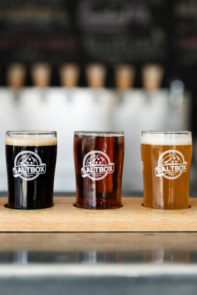 A photo of three taster glasses of different Saltbox Brewery beers.